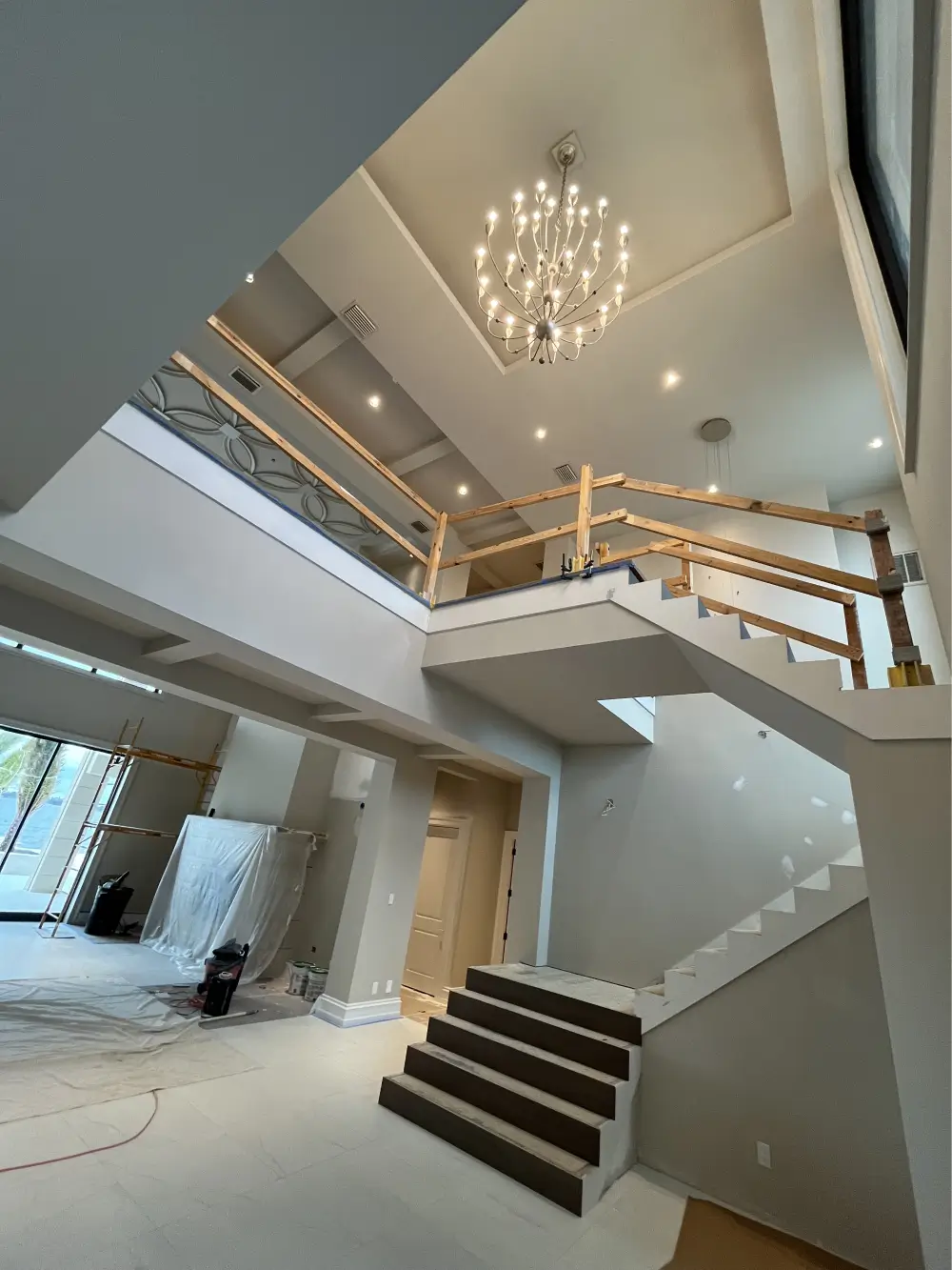 Modern coastal living room interior design in fort-myers featuring layered textures and natural light